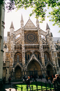 Group of people in front of historic building