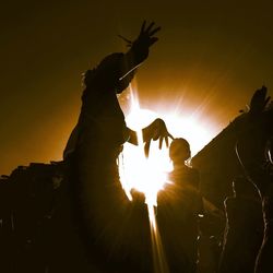Low angle view of silhouette trees against sky at sunset