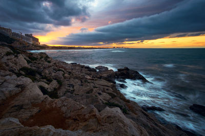 Scenic view of sea against sky during sunset