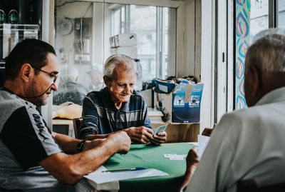Group of people working on table