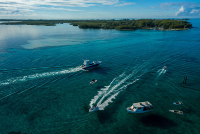 High angle view of sailboat sailing in sea