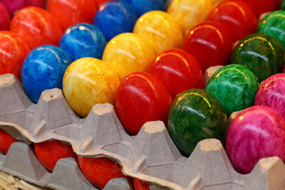 Close-up of colorful easter eggs on carton
