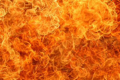 Full frame shot of fire crackers against black background