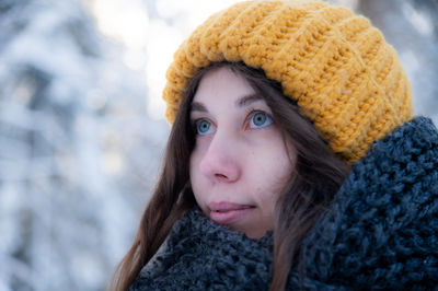 Portrait of young woman wearing warm clothing