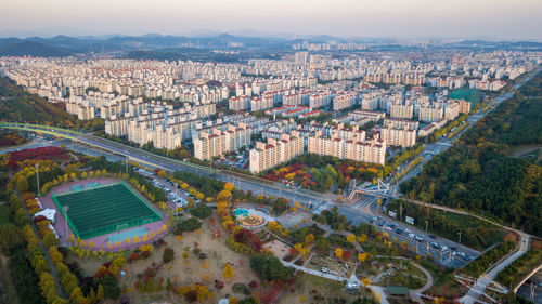 High angle view of street amidst buildings in city