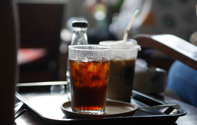 Close-up of beer in glass on table