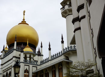 Low angle view of sultan mosque against sky