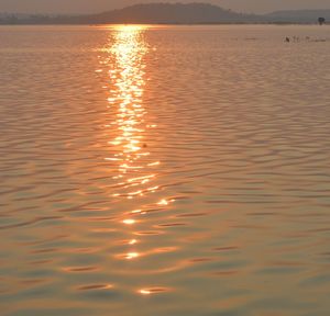 Close-up of sea at sunset