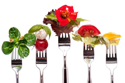 Close-up of fruits against white background