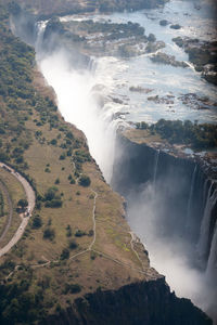 High angle view of waterfall against sky