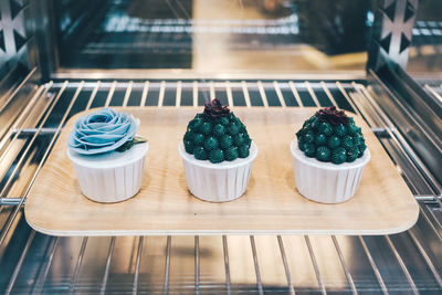 High angle view of cupcakes on table