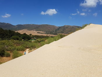 Scenic view of landscape against sky, sandune