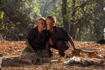 Man and woman in forest