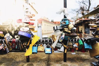 Close-up of padlocks hanging on metal chain