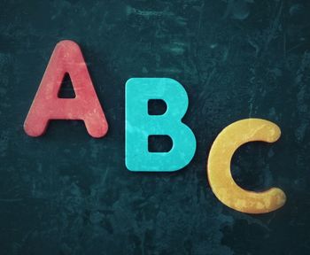 Multi colored alphabets on blackboard