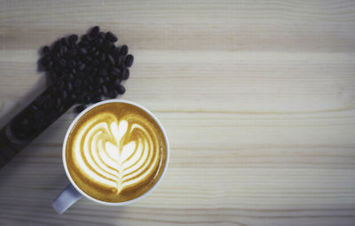 Directly above shot of cappuccino on table