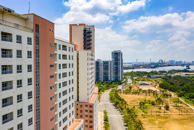 Buildings in city against sky