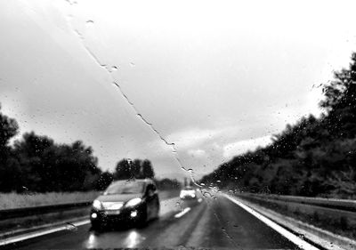 Road passing through car windshield