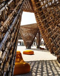 Wooden built structures at beach during sunny day