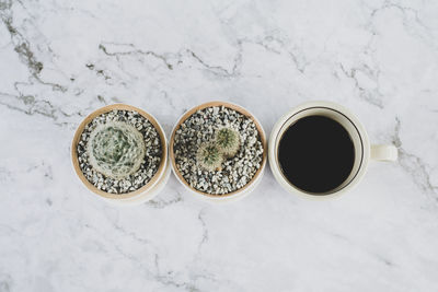 High angle view of coffee cup on floor