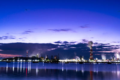 Boats in sea against sky during sunset