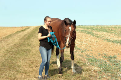 Full length of a horse on field