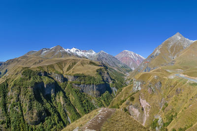 Mountain landscape near gudauri from georgia-russia friendship monument, georgia