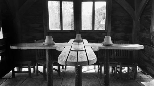 Empty chairs and tables in restaurant