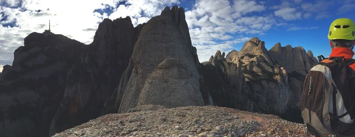 Panoramic view of rocks and mountains against sky