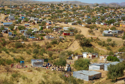 High angle view of buildings and houses in city