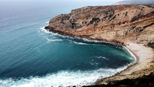 Scenic view of rocks in sea