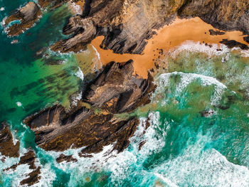 High angle view of rocks on beach