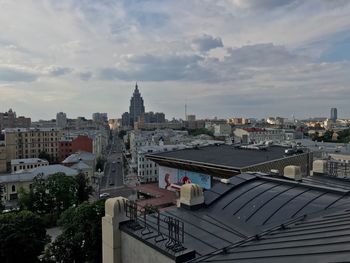 High angle view of buildings in city against sky