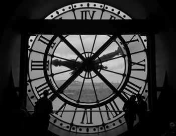 People standing in clock tower