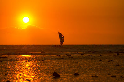 Scenic view of sunset over sea