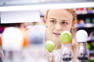 Beautiful woman in supermarket