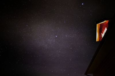 Low angle view of building against sky at night