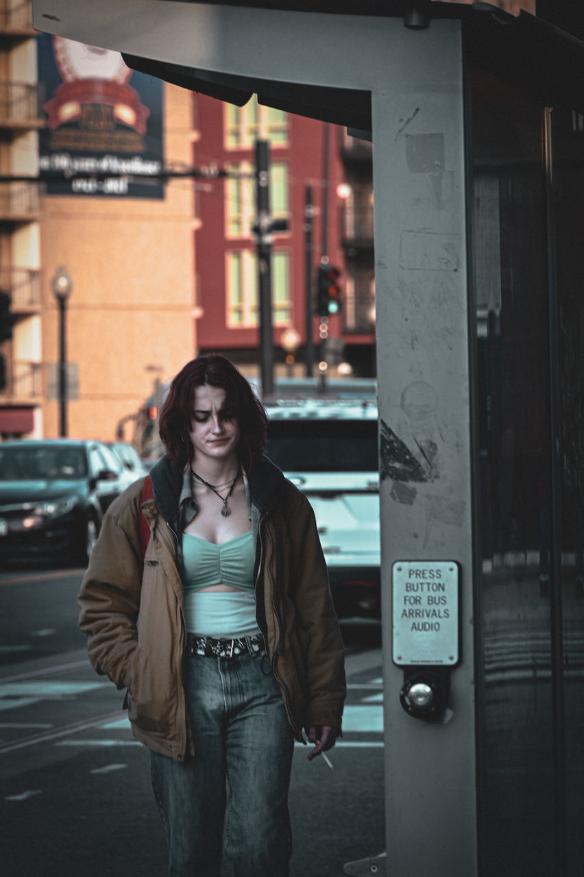 City gir Front View City Three Quarter Length Standing Architecture Building Exterior One Person Young Adult Street Real People Adult Looking At Camera Women Smiling Young Women Casual Clothing Portrait Long Hair Built Structure Hairstyle