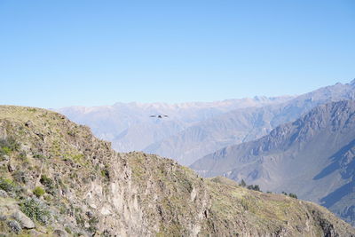 Scenic view of mountains against clear sky