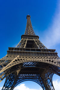 Low angle view of historical building against blue sky