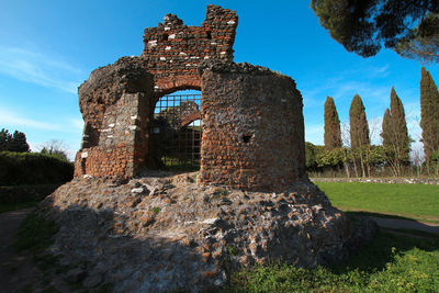Appia antica, rome, pines and ruins of ancient