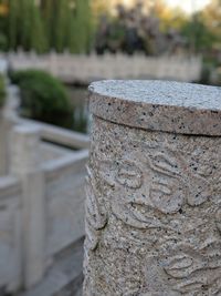 Close-up of cross against blurred background