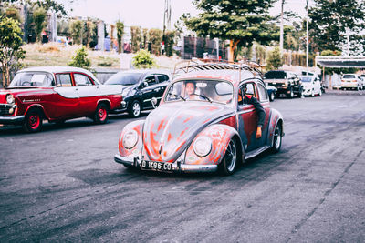 Vintage car on road in city