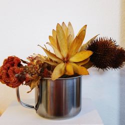 Close-up of flower vase on table