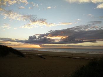 Scenic view of sea at sunset