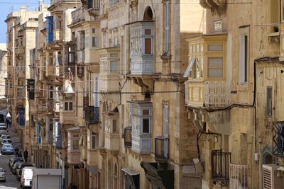Street in valletta, buildings with balconys 