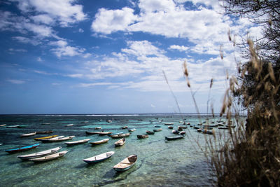 Scenic view of sea against cloudy sky