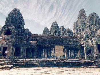 Old temple building against sky