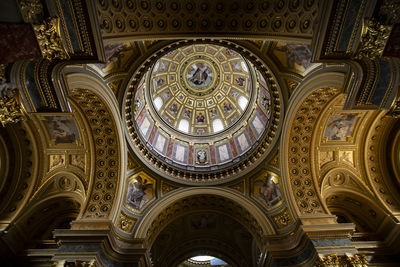Low angle view of ornate ceiling in historic building