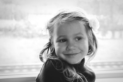 Close-up portrait of a smiling girl